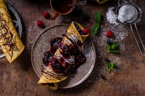 Delicious crepes with forest fruit Stock Photos