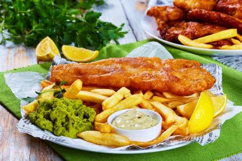 Delicious crispy fish and chips, close-up Stock Photos