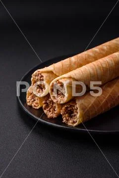 Delicious crispy wafer rolls with cream filling with nuts ~ Hi Res ...