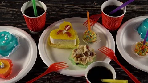 Delicious cupcakes with drinks. Stock-Footage 74232545