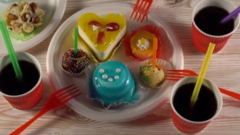 Delicious cupcakes with drinks. Stock Footage 74237688