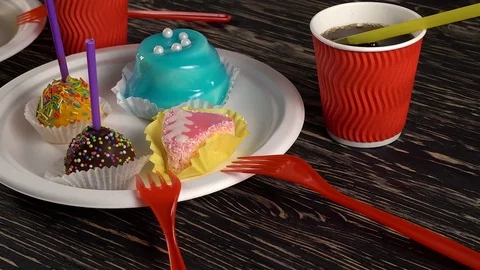 Delicious cupcakes with drinks. Stock Footage 74270067