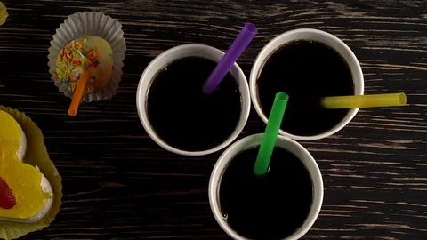 Delicious cupcakes with drinks. Stock Footage 74346778