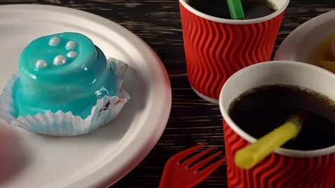 Delicious cupcakes with drinks. Stock-Footage 74721322