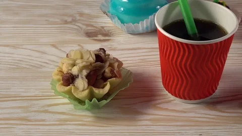Delicious cupcakes with drinks. Stock-Footage 74776180