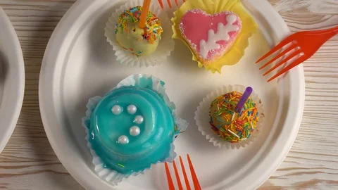 Delicious cupcakes with drinks. Stock Footage 74812387