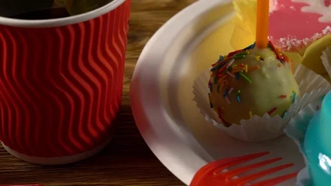 Delicious cupcakes with drinks. Stock Footage 74948701