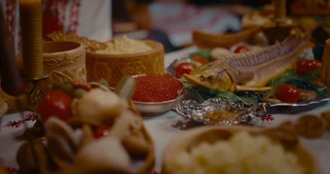 Delicious delicatessen on table in old Slavic village, closeup of sturgeon and 스톡 동영상 258508239