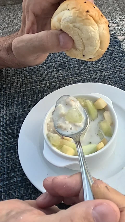 Delicious Dessert Experience: A Close-Up of Hands Enjoying a Sweet Treat with Video stock 331116588