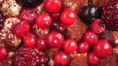 Delicious dessert with mixed berries and chocolate layers Stock Footage 332588461