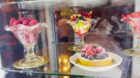 Delicious desserts inside a display case Stock Footage 259340300