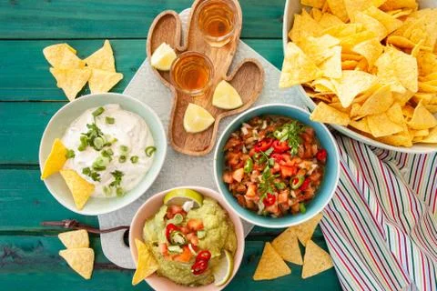 Delicious dips with tortilla chips Stock Photos