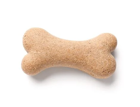 Delicious dog biscuit in shape of bone isolated on white background Stock Photos