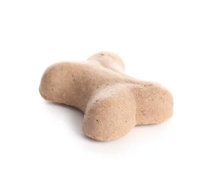 Delicious dog biscuit in shape of bone isolated on white background Stock Photos