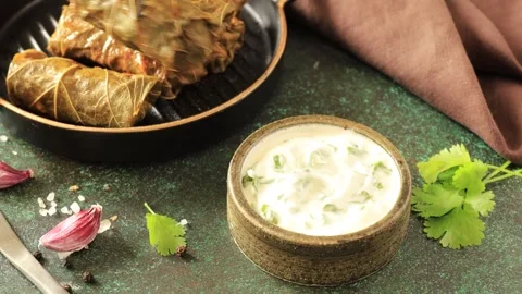 Delicious dolma - stuffed grape leaves with rice and meat. Stock Footage 248856850
