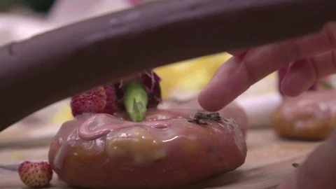 Delicious Donut for breakfast Stock Footage 114977684