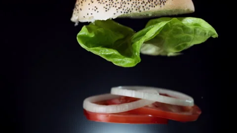 Delicious double burger on the black background Stock Footage 335469728