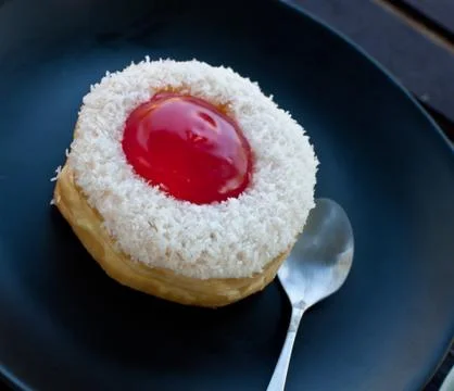 Delicious  doughnut  on the disk Photos