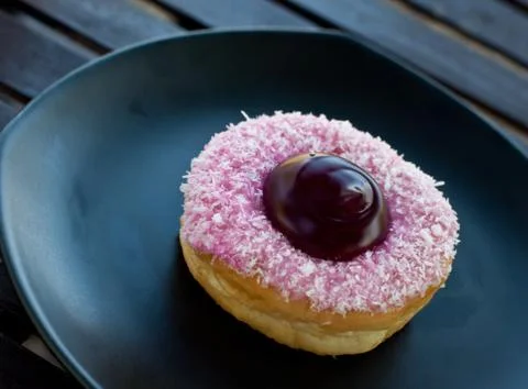 Delicious  doughnut  on the disk Stock Photos