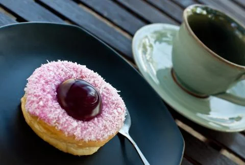 Delicious  doughnut  on the disk Stock Photos