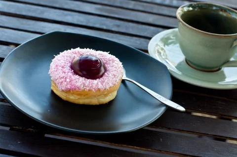 Delicious  doughnut  on the disk Stock Photos