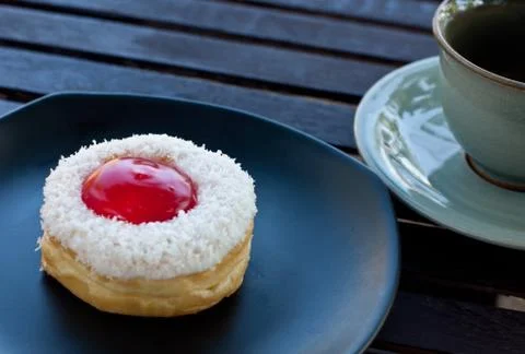 Delicious  doughnut  on the disk Stock Photos