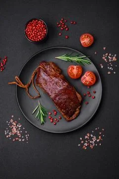 Delicious duck fillet or breast grilled or smoked with spices and salt Stock Photos