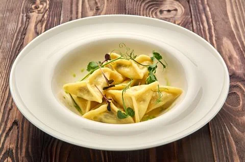 Delicious dumplings in a deep dish Stock Photos
