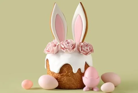 Delicious Easter cake with bunny ears, roses and painted eggs on green backgr Stock Photos