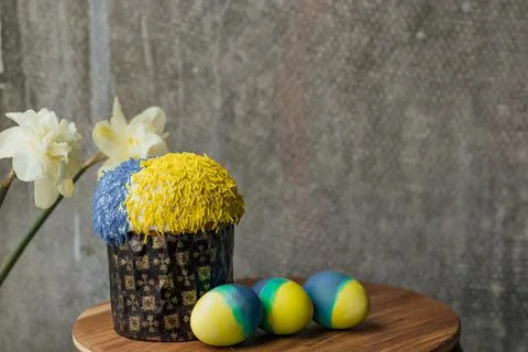 Delicious Easter cake in the colors of the flag of Ukraine, yellow-blue color Stock Photos