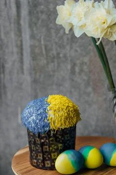 Delicious Easter cake in the colors of the flag of Ukraine, yellow-blue color Stock Photos