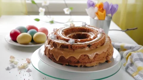 Delicious Easter cake on kitchen table Stock Footage 169822110