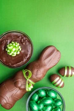 Delicious Easter chocolate bunny, eggs and sweets Stock Photos