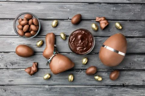 Delicious Easter chocolate bunny, eggs and sweets Stock Photos