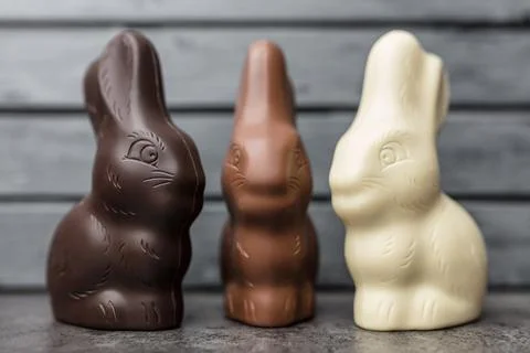 Delicious Easter chocolate bunny, eggs and sweets Stock Photos