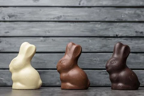 Delicious Easter chocolate bunny, eggs and sweets Stock Photos