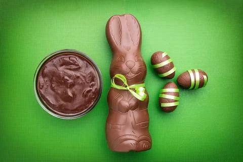 Delicious Easter chocolate bunny, eggs and sweets Stock Photos