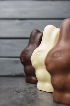 Delicious Easter chocolate bunny, eggs and sweets Stock Photos
