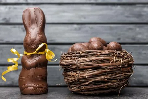 Delicious Easter chocolate bunny, eggs and sweets Stock Photos