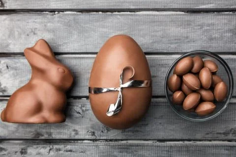 Delicious Easter chocolate bunny, eggs and sweets Stock Photos