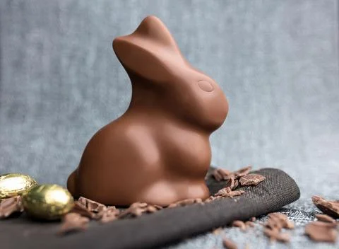 Delicious Easter chocolate bunny, eggs and sweets Stock Photos
