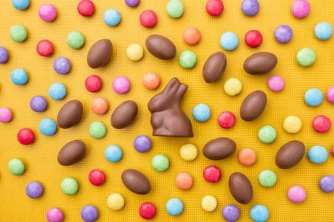 Delicious Easter chocolate bunny, eggs and sweets Stock Photos