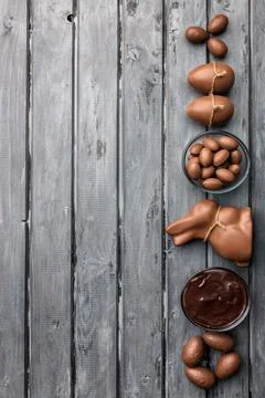 Delicious Easter chocolate bunny, eggs and sweets Stock Photos