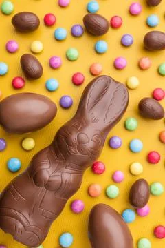 Delicious Easter chocolate bunny, eggs and sweets Stock Photos