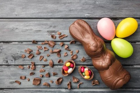 Delicious Easter chocolate bunny, eggs and sweets Stock Photos