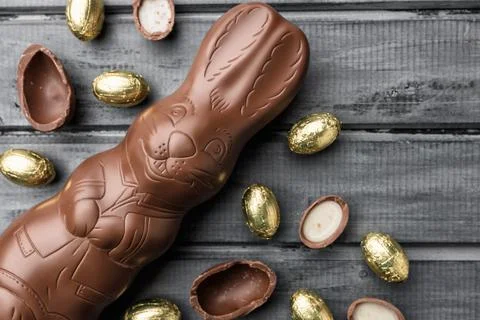 Delicious Easter chocolate bunny, eggs and sweets Stock Photos