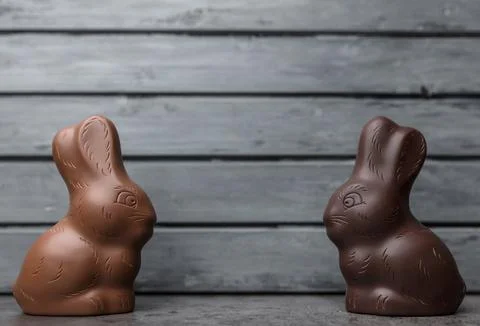 Delicious Easter chocolate bunny, eggs and sweets Stock Photos