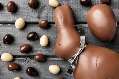 Delicious Easter chocolate bunny, eggs and sweets Stock Photos