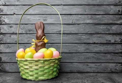 Delicious Easter chocolate bunny, eggs and sweets Stock Photos