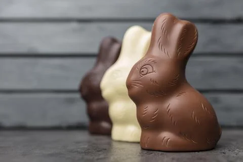 Delicious Easter chocolate bunny, eggs and sweets Stock Photos
